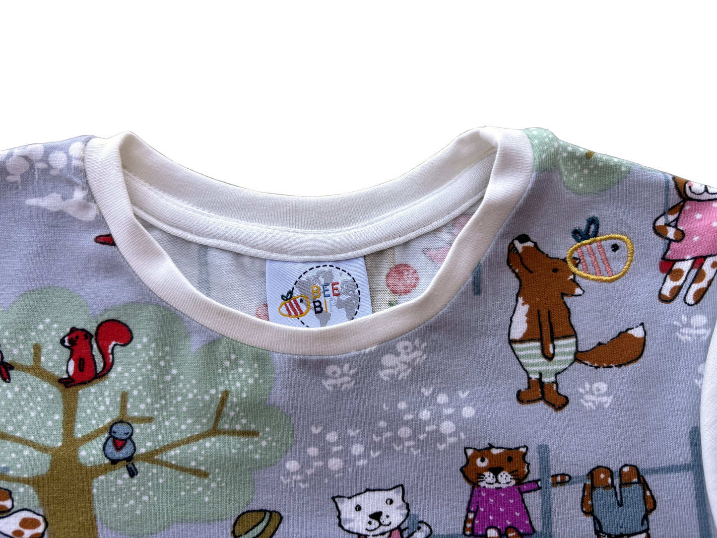 Maglietta a manica lunga in cotone biologico – Avorio con fantasia Parco Giochi